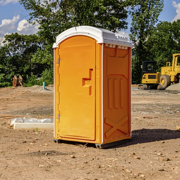 what is the cost difference between standard and deluxe portable restroom rentals in Allenville